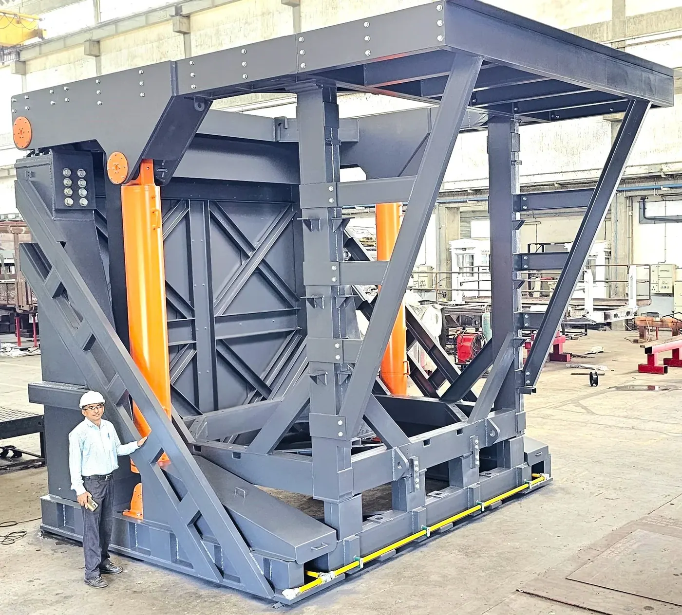 Furnace crucible frame fabricated for export to Germany, person for scale